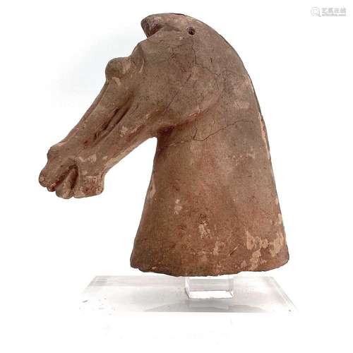 A Chinese pottery horse head possibly Tang period.