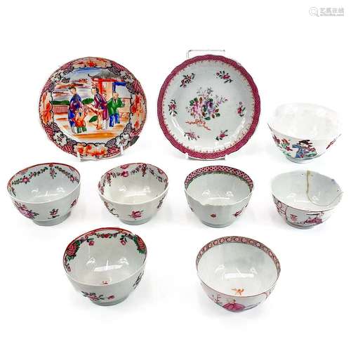 A Chinese porcelain Famille rose tea bowl and saucer.