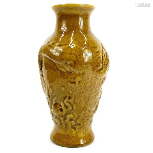 A 20th century Chinese pottery jaune glazed vase.