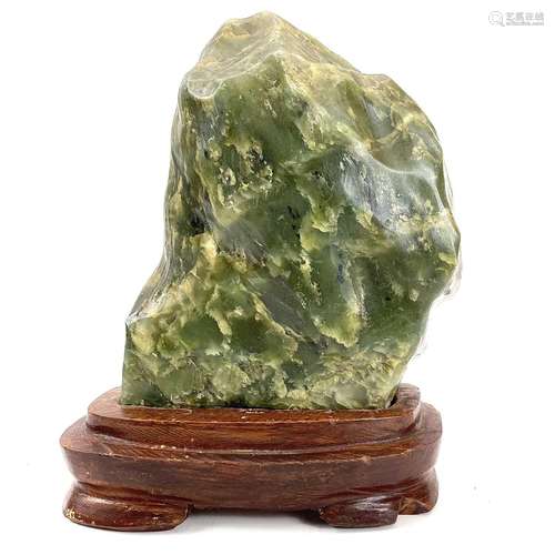 An early 20th century nephrite scholar rock sculpture.