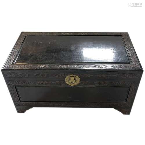 A Chinese carved camphor wood chest, mid 20th century.