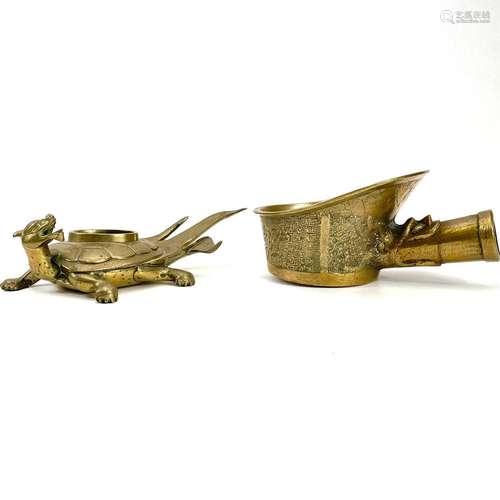 A Chinese brass vessel or censer modeled as a mythical creat...