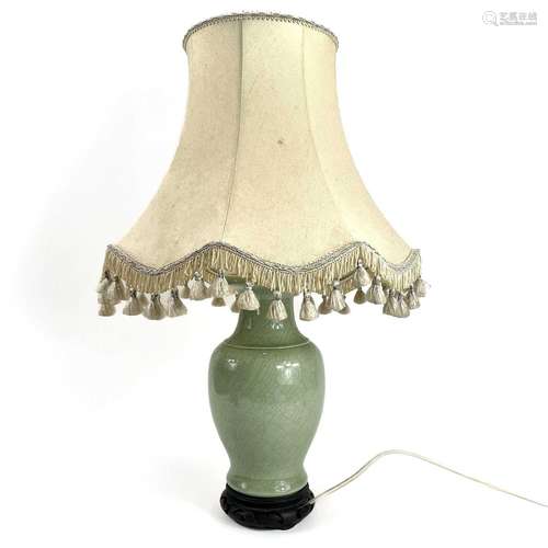 A Chinese porcelain crackle glaze celadon table lamp.