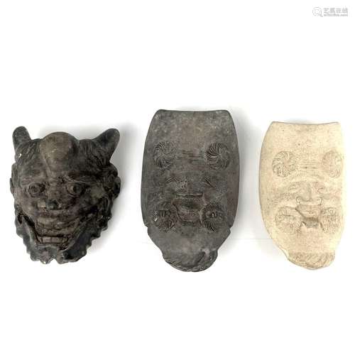 Three Japanese pottery Noh masks.