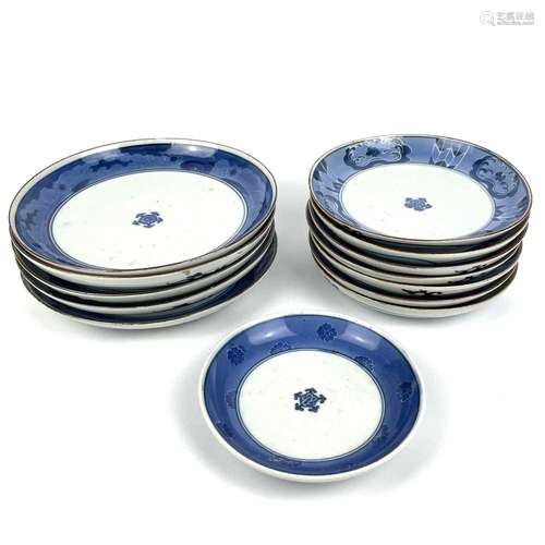 Thirteen Japanese Nabeshima blue and white porcelain plates,...