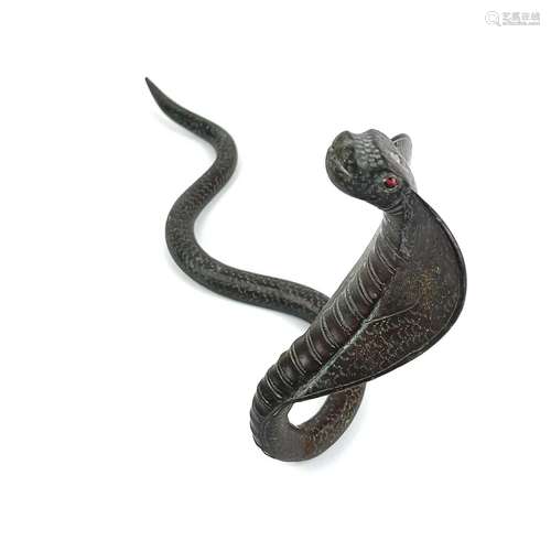 An Indian bronze sculpture of a cobra, 19th century.