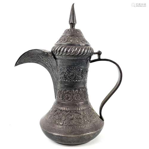 A Middle Eastern white metal dallah pot, circa 1900.