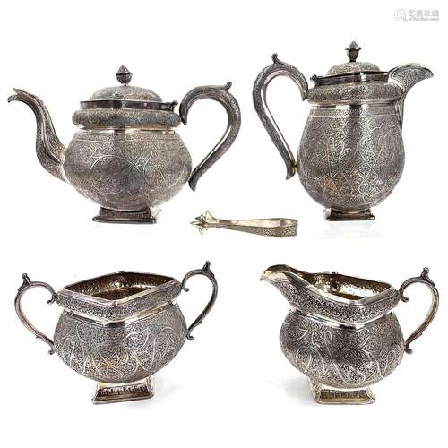 A Kashmir four piece silver tea set with finely chased flora...