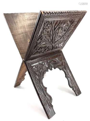 A carved hardwood folding Koran stand.