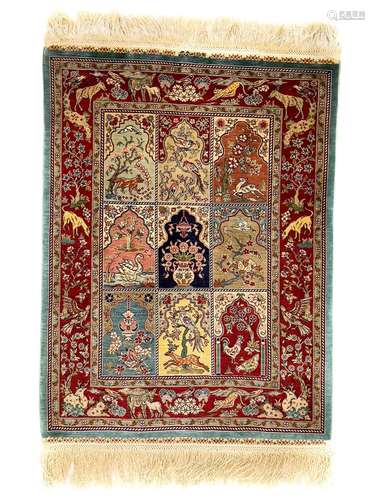 A Hereke silk rug.