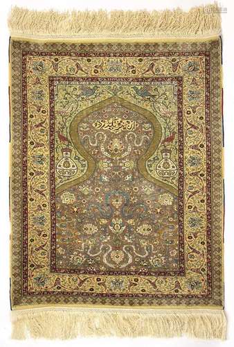 An exceptionally fine Hereke silk rug.