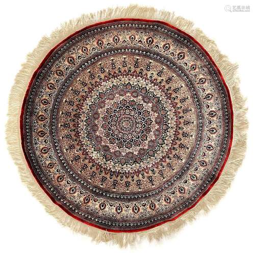 A very fine Persian silk circular rug.