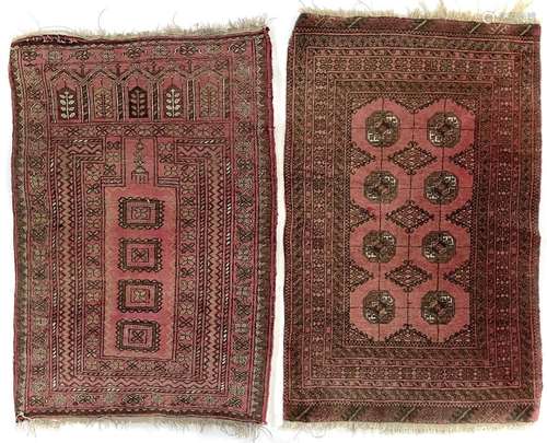 An Afghan prayer rug and another Afghan rug, circa 1920-1930...