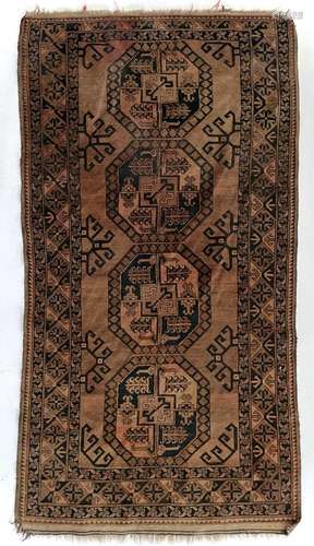 An Afghan rug, circa 1900.