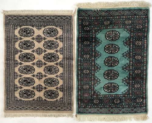 Two Pakistan rugs.