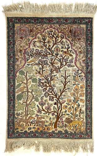 A Persian art silk prayer rug, mid 20th century.