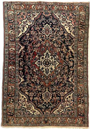 A North West Persian rug, circa 1900-1920.