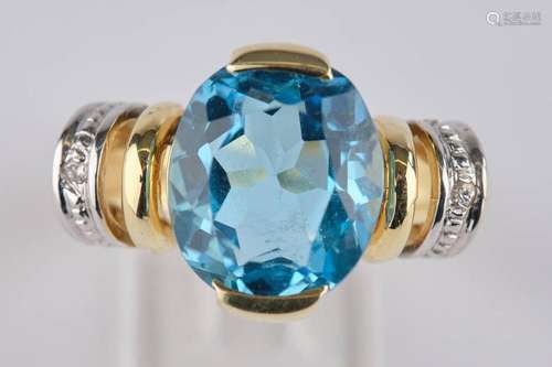 Ring, GG/WG 585, oval facettierter Blautopas