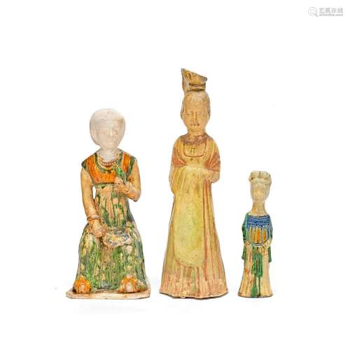 A GROUP OF THREE POTTERY LADIES Sui/Tang Dynasty and part la...