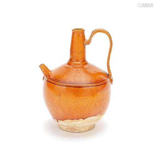 AN AMBER GLAZED POTTERY EWER Liao Dynasty