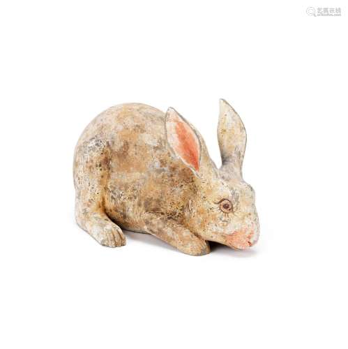 A PAINTED POTTERY MODEL OF A RECUMBENT RABBIT Han Dynasty