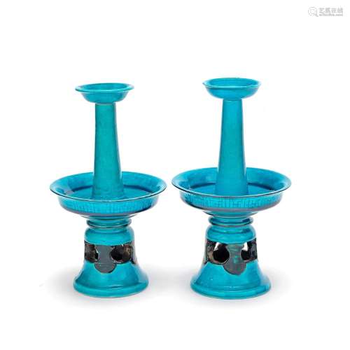 A PAIR OF TURQUOISE AND AUBERGINE-GLAZED CANDLESTICKS Kangxi...