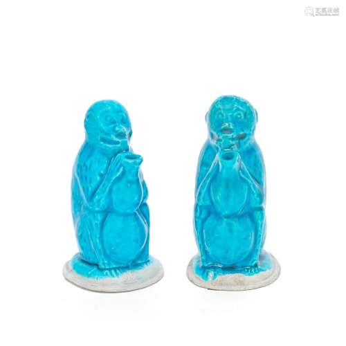 A PAIR OF TURQUOISE GLAZED 'MONKEYS' WATER DROPPERS ...