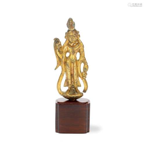 A SMALL GILT BRONZE STANDING FIGURE OF GUANYIN Tang Dynasty ...