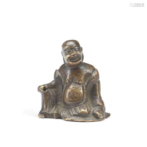 A SMALL GILT BRONZE 'BUDAI' SCROLL WEIGHT Late Ming ...