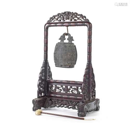 A DOCUMENTARY BRONZE BELL AND HONGMU STAND The bell, dated Q...
