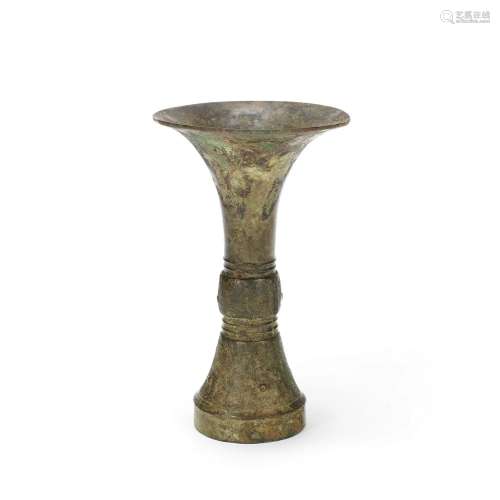 AN ARCHAIC BRONZE WINE VESSEL, GU Probably Late Shang Dynast...