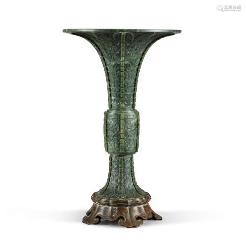 A large spinach-green jade archaistic beaker vase, Gu, Qing ...