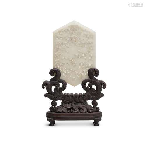 A reticulated white jade 'dragon' plaque, Late Ming ...