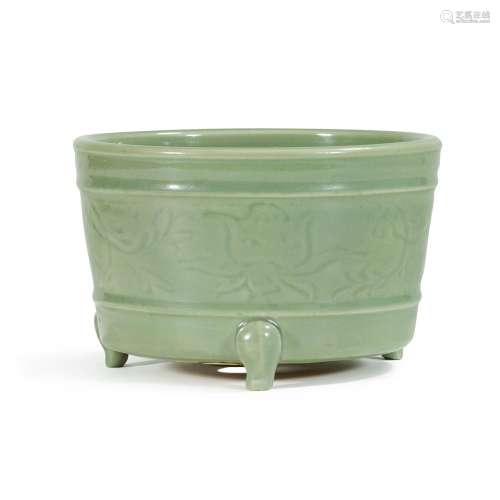 A carved Longquan celadon-glazed tripod censer, Ming dynasty...