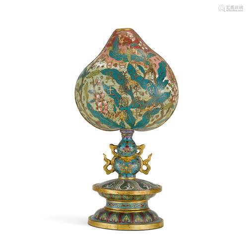 An imperially inscribed cloisonné enamel peach, Qing dynasty...