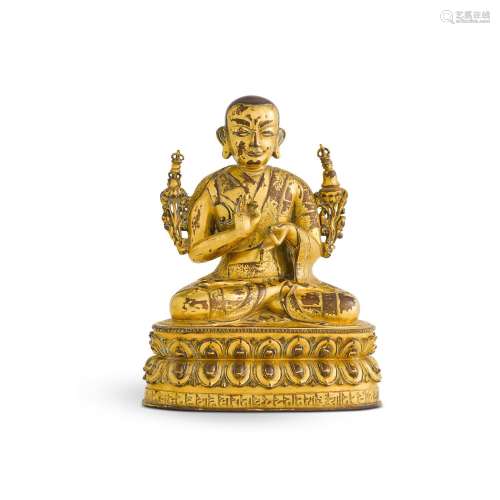A gilt-bronze figure of a lama, Qing dynasty, 18th century |...