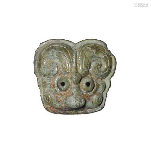 An archaic bronze animal mask, Western Zhou dynasty | 西周 青...