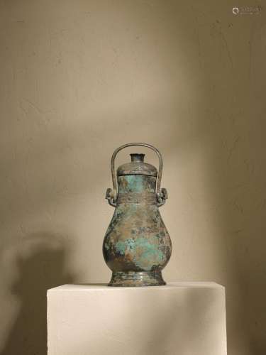 A rare large inscribed archaic bronze ritual wine vessel and...