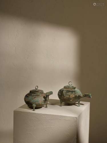 Two bronze tripod pouring vessels, He, Han dynasty | 漢 青銅...