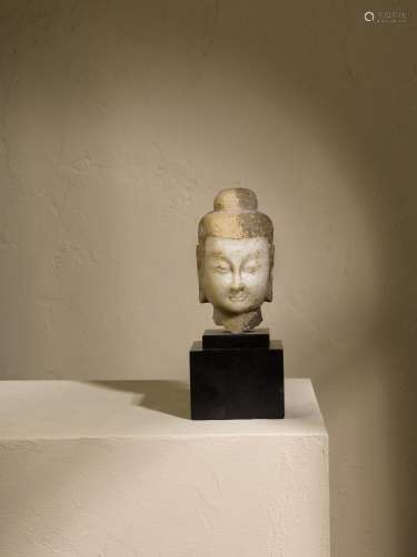 A small white marble head of a Buddha, Northern Wei dynasty ...