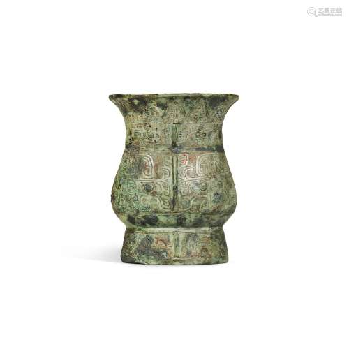 A small archaic bronze ritual wine vessel, zhi, Late Shang/e...
