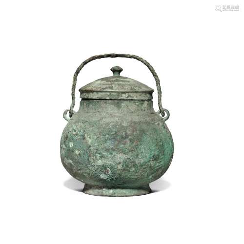 An archaic bronze ritual vessel and cover, You, Early Wester...