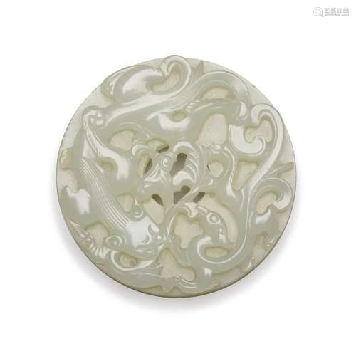 A small archaistic white jade ‘dragon’ bi disc, Qing dynasty...