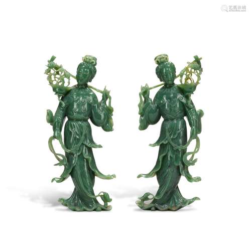 A pair of spinach-green jade figures of ladies, 19th/20th ce...