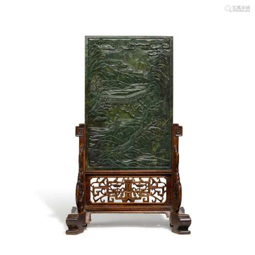 A large spinach-green jade screen, Qing dynasty, late 19th c...