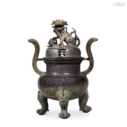 An inscribed bronze 'lion' censer and cover, Ming dy...