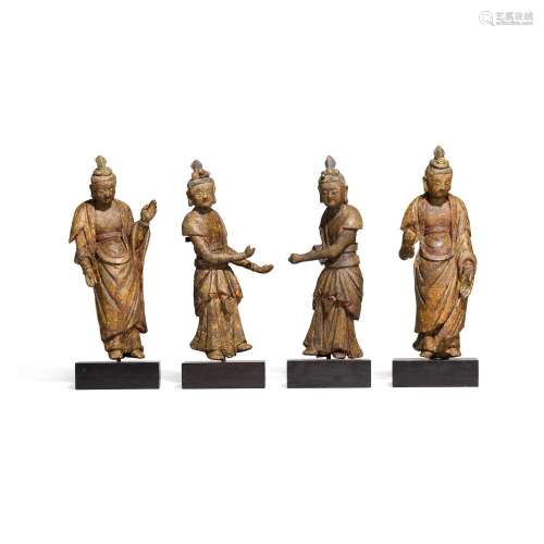 A rare set of four stucco standing figures of Bodhisattva, S...