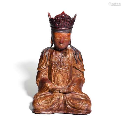 A large lacquered wood seated figure of Bodhisattva, Yuan/Mi...