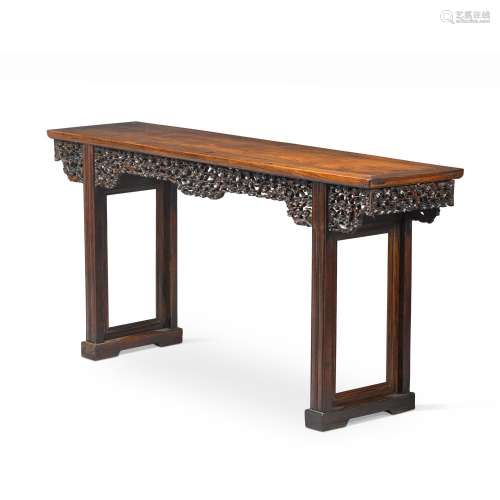 A carved and reticulated hongmu table, Qing dynasty, 19th ce...