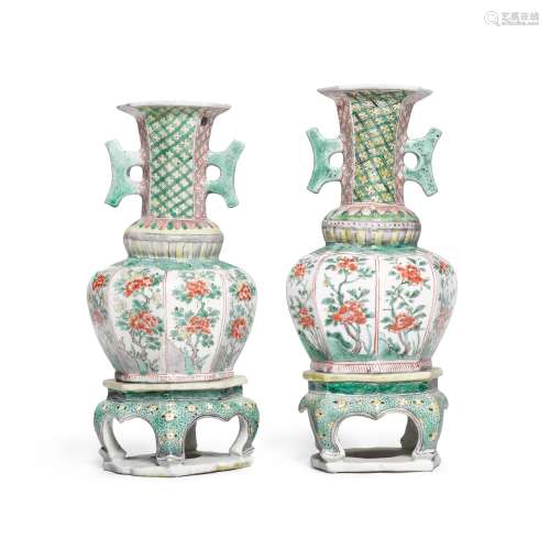 A pair of famille-verte two-handled octagonal vases and stan...